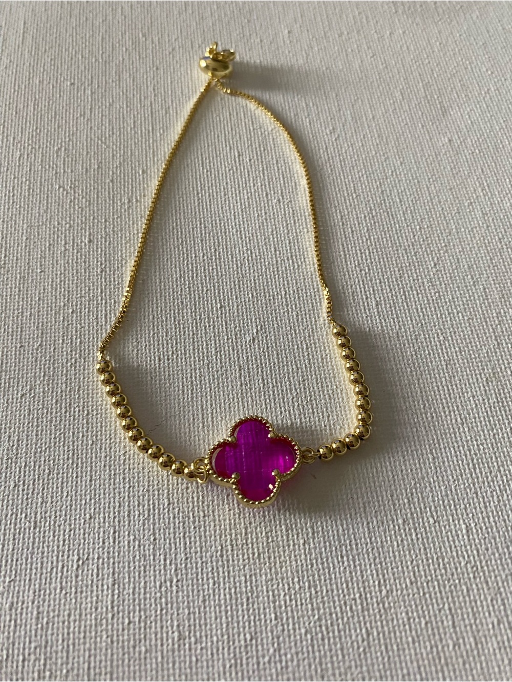 Gold Beaded Bracelet with Pink Clover Accent